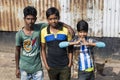 Barisal, Bangladesh, February 27 2017: Three teenagers pose at the pier