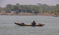 Barisal, Bangladesh, March 12, 2023, Beautiful Southeast Asian fishers daily life. Rural fisherman on a small dinghy floating on