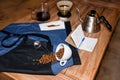 Barista apron on the table in cafe with various stuff for alternative coffee brewing. Product photography. Preparation