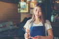 Barista asian young woman Cafe Making Coffee Preparation. Royalty Free Stock Photo