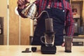 Barista brewing aeropress coffee