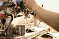 Barista brewing coffee using espresso machine Royalty Free Stock Photo