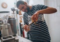 Barista driping coffee into glass cup Royalty Free Stock Photo