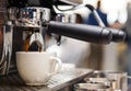 Barista machine in coffee shop. Americano being made. Royalty Free Stock Photo