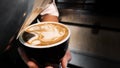 Barista making cafe latte art, delicious coffee with milk Royalty Free Stock Photo