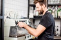 Barista making coffee Royalty Free Stock Photo