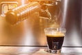 Barista making a espresso with a classic coffee machine Royalty Free Stock Photo