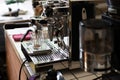 Barista Making Espresso with Coffee Machine Royalty Free Stock Photo