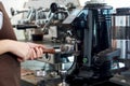 Barista making fresh espresso coffee. Espresso Machine Portafilters. Closeup Royalty Free Stock Photo