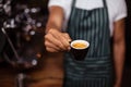 Barista offering an espresso Royalty Free Stock Photo