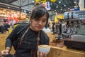 Barista pouring latte froth make coffee latte art