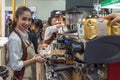 Barista pouring latte froth make coffee latte art