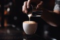 Barista pouring milk into cup of coffee, closeup. Barista making cappuccino, A planetary system and space with stars, AI Generated Royalty Free Stock Photo