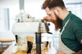 Barista pouring water on coffee ground with filter Royalty Free Stock Photo