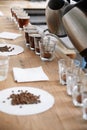 Barista pouring water to coffee cups Royalty Free Stock Photo