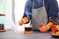 barista preparing cinnamon put on drip coffee make aroma coffee