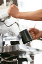 Barista Preparing Coffee On Coffee Machine