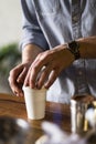 Barista preparing coffee to go