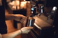 Barista preparing coffee using machine in the cafe Royalty Free Stock Photo