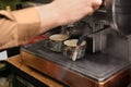 Barista preparing espresso using coffee machine Royalty Free Stock Photo