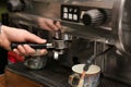 Barista preparing espresso using coffee machine Royalty Free Stock Photo