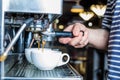 Barista preparing fresh coffee in cafe Royalty Free Stock Photo