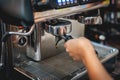 Barista preparing to make coffee in coffee shop