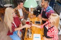 Barista serving clients give cup coffee shop bar counter Royalty Free Stock Photo