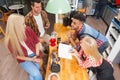 Barista serving clients give cup coffee shop bar counter Royalty Free Stock Photo