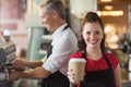 Barista smiling at the camera Royalty Free Stock Photo