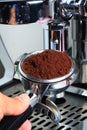 Barista take coffee grind to making Espresso Royalty Free Stock Photo