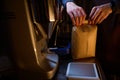 Barista unpack package with coffee beans before espresso brewing