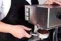 Barista using an espresso machine. Royalty Free Stock Photo