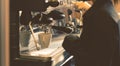 Barista woman making espresso coffee from professional machine preparation service concept Royalty Free Stock Photo