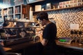 Barista at work in a coffee shop