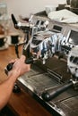 Barista Working On Coffee Machine In Cafe Closeup