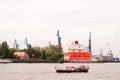 Launch boat on Elbe River cruising shipyard Blohm und Voss .