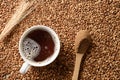 Barley coffee in white cup and ears of barley. Royalty Free Stock Photo