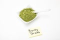 Barley grass green powder, a superfood for health and alternative cancer treatment Royalty Free Stock Photo