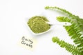 Barley grass green powder, a superfood for health and alternative cancer treatment Royalty Free Stock Photo