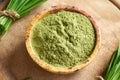 Barley grass powder with fresh barley gras Royalty Free Stock Photo