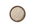 Barley groats on a white background top view. Raw crushed barley grains for making porridge. Heap of barley grits isolated on whit Royalty Free Stock Photo