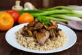 Barley porridge, fried mushrooms and duck liver, boiled quail eggs, tomatoes, arugula - healthy food Royalty Free Stock Photo