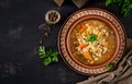 Barley soup with carrots, tomato, celery and meat Royalty Free Stock Photo