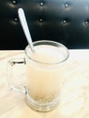 Barley water in glass. Vertical photo image.