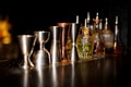 Barman equipment such as cups and essence on the bar counter