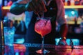 Barman making cocktail at bar counter in night club, closeup