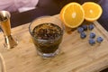 Barman mixes alcohol cocktail on the rocks. Hands close-up. Royalty Free Stock Photo