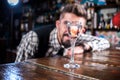 Bartender concocts a cocktail in the beerhall