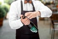 Barman opening bottle with sparkling wine Royalty Free Stock Photo